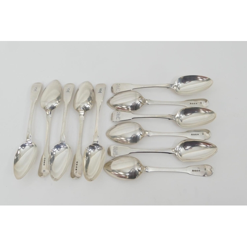 111 - Eleven silver fiddle pattern table spoons, comprising seven George III by William Eley and William F... 