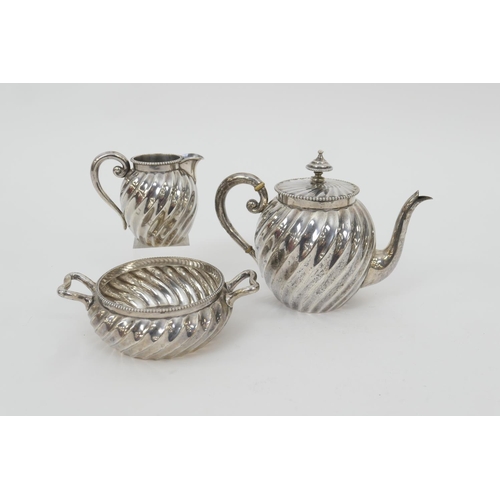 112 - Dutch 833 standard silver three piece tea service, early 20th Century, comprising wrythen bullet for... 