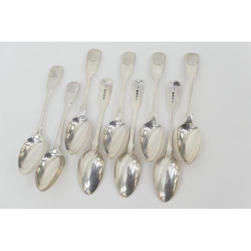 118 - Seven George IV silver fiddle pattern dessert spoons, maker W B, London 1829; and two further silver... 