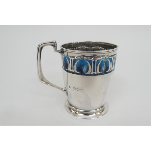 128 - Edwardian silver and enamelled christening tankard, by William Hutton and Sons, London 1902, ovoid f... 