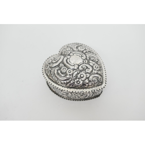 129 - Late Victorian silver heart shaped ring box, by Nathan & Hayes, Birmingham 1894, repousse decorated ... 