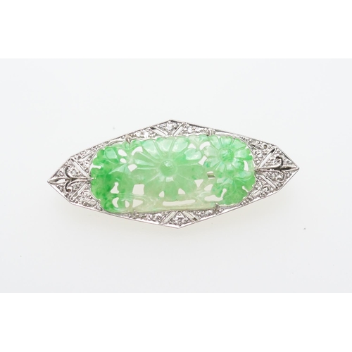 434 - Art Deco carved jade and diamond brooch in 18ct gold and platinum, lozenge shape centred with a jade... 