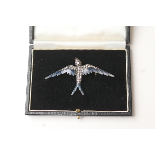 436 - Diamond and enamel swallow brooch, set with 53 small round cut diamonds and cabochon ruby eyes, the ... 