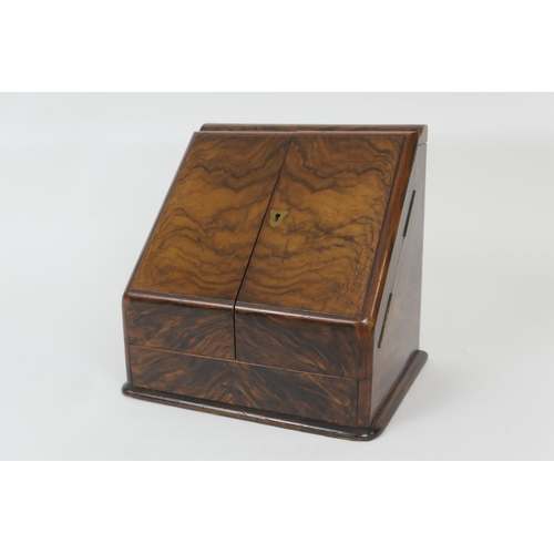 499 - Victorian walnut stationery box, hinged top and slope front opening to reveal a comparted interior w... 