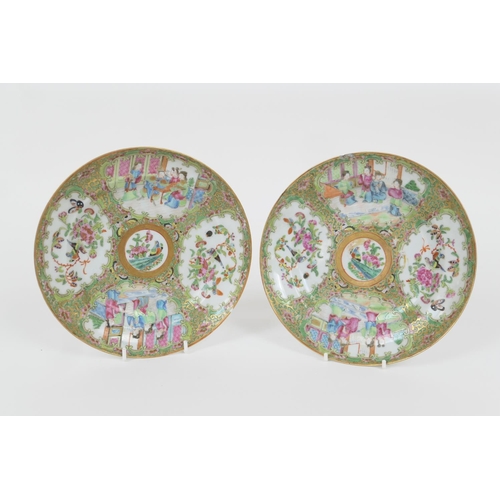 50 - Pair of Cantonese famille rose saucer dishes, late 19th Century, decorated in typical palette, 20.5c... 