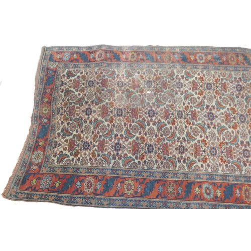 660 - Bidjar woollen runner, circa 1900, fawn field with a herati of flowerheads and crescent form foliage... 