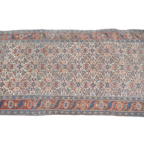 660 - Bidjar woollen runner, circa 1900, fawn field with a herati of flowerheads and crescent form foliage... 