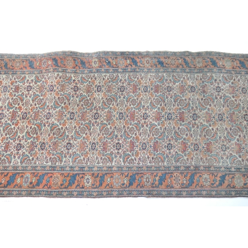 660 - Bidjar woollen runner, circa 1900, fawn field with a herati of flowerheads and crescent form foliage... 