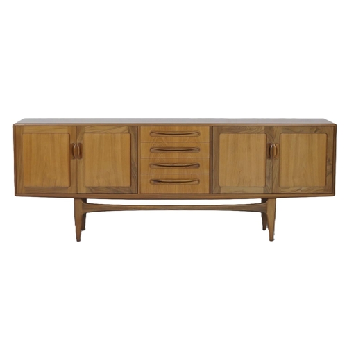 667 - G-Plan Fresco teak long sideboard, centred with four drawers with two cupboard doors at either side,... 