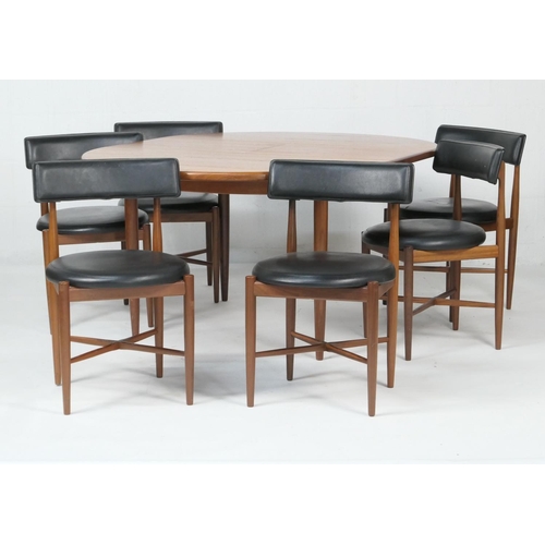 668 - G-Plan teak Fresco extending dining table and  chairs, the circular table 122cm diameter, extending ... 