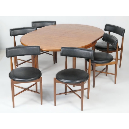 668 - G-Plan teak Fresco extending dining table and  chairs, the circular table 122cm diameter, extending ... 