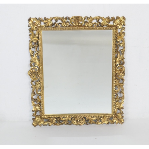 669 - Florentine style carved giltwood wall mirror, the frame carved with acanthus scrolls, late 19th or e... 