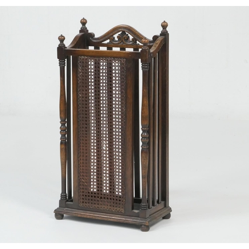 685 - George V oak stick stand, with bergere panel front, original drip tray, height 79cm, width 38cm