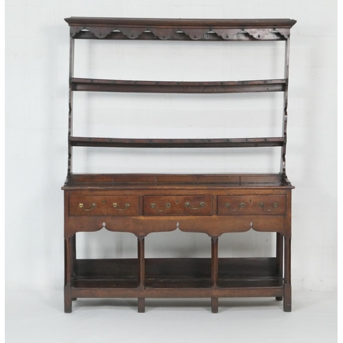 694 - Early George III oak dresser and plate rack, North Wales, circa 1760, open rack with a shaped apron ... 