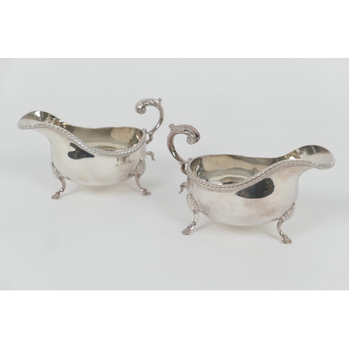 70 - Pair of Elizabeth II silver sauceboats, by Roberts & Belk, Sheffield 1971, plain form with gadrooned... 