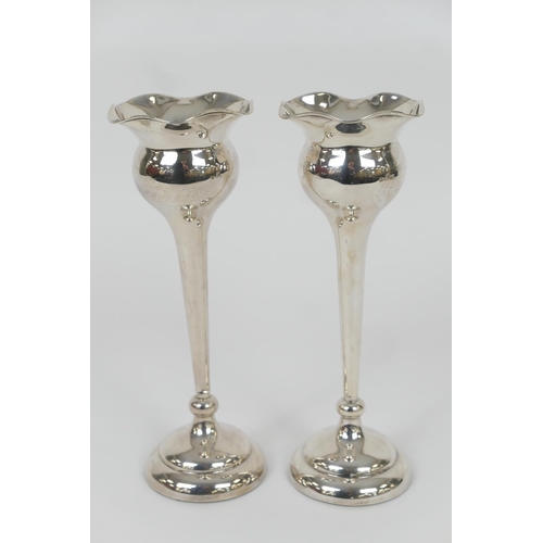 71 - Pair of George V silver 'tulip' vases, Birmingham 1921, flared bulb form with tapered stem, stepped ... 