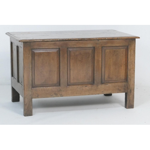 711 - Oak joined chest, 18th Century, the well patinated top with some burr, over a three fielded panel fr... 