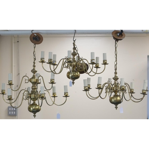 712 - Pair of Dutch style brass eight branch chandeliers, modern, 39cm drop, with the addition of ceiling ... 