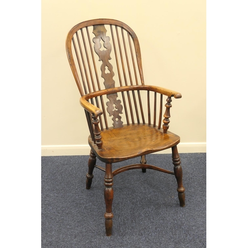 714 - Yewood and elm high back Windsor chair, with crinoline stretcher, width 53cm, height 110cm