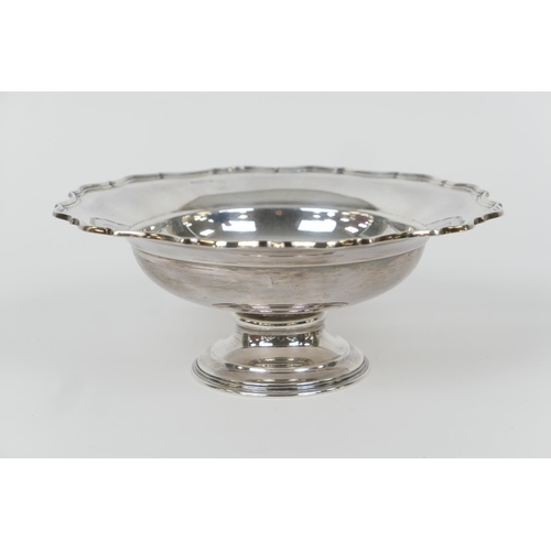 72 - George V silver footed fruit bowl, by Barker Bros., Chester 1919, shaped circular form over a steppe... 