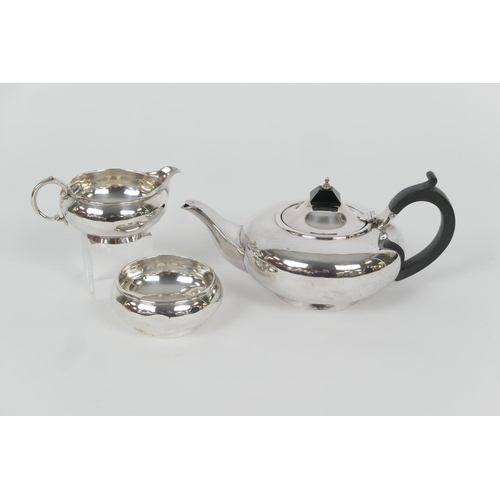 76 - George V silver three piece tea service, by Richard Woodman Burbridge for Harrods Ltd, London 1928, ... 