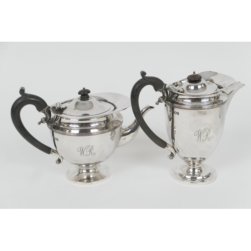 80 - George V silver teapot and matching hot water jug, by Holland, Aldwinckle and Slater, London 1910, o... 