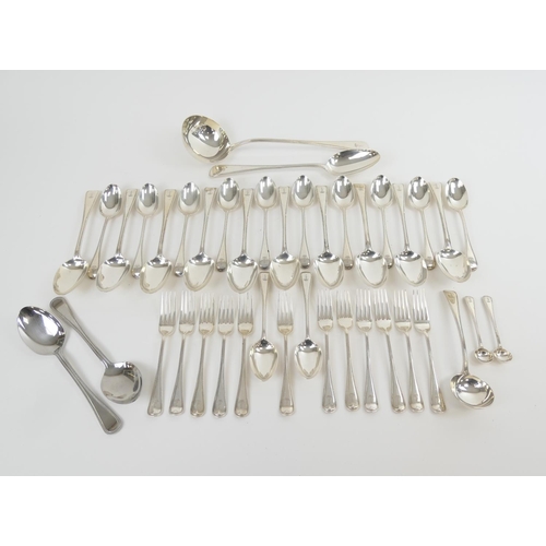 95 - Victorian silver loose canteen of cutlery by George Adams and Barnard & Sons, mostly London 1869, co... 