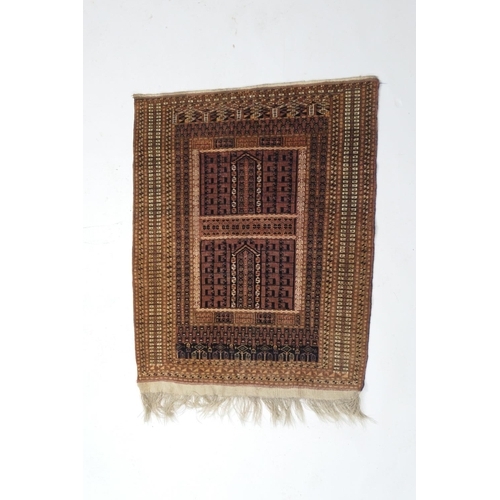 700 - Bokhara woollen rug, faded madder ground and multi guard stripe border, size approx. 125cm x 96cm