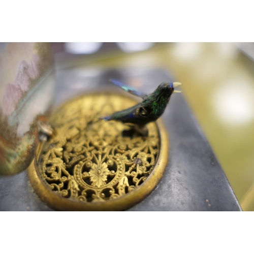 553 - Tortoiseshell singing bird automata music box, 19th Century, having a landscape enamelled cover open... 