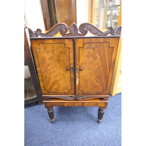 631 - George IV mahogany collector's cabinet, dated 1826, in the manner of George Bullock, the carved anth... 