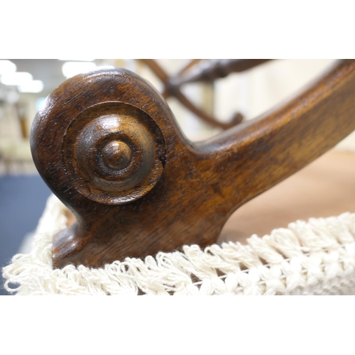 646 - Early Victorian mahogany and ivory coloured fabric companion stool, with cross form supports united ... 