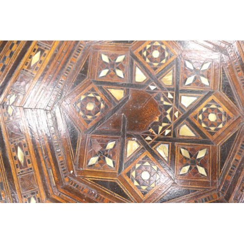 649 - Moorish octagonal parquetry table, circa 1900, inlaid throughout with mother of pearl and wood tesse... 