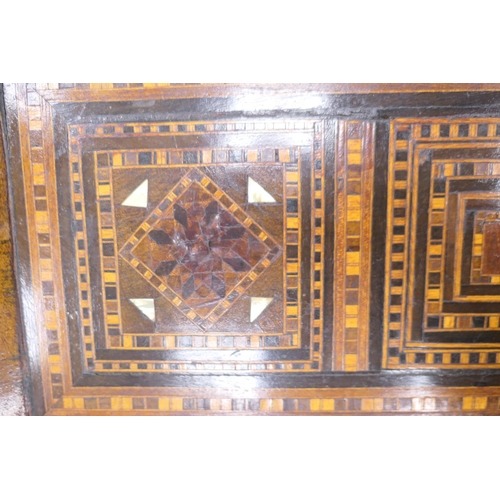 649 - Moorish octagonal parquetry table, circa 1900, inlaid throughout with mother of pearl and wood tesse... 