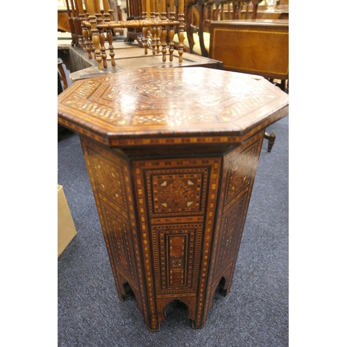 649 - Moorish octagonal parquetry table, circa 1900, inlaid throughout with mother of pearl and wood tesse... 