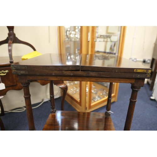 696 - William IV rosewood washstand, square folding top on turned and tulip carved slender columns with po... 