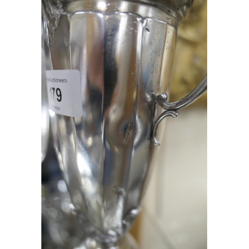 179 - Pair of Kaiser silver plated vases, circa 1910, each having a cut and shaped glass liner, with twin ... 