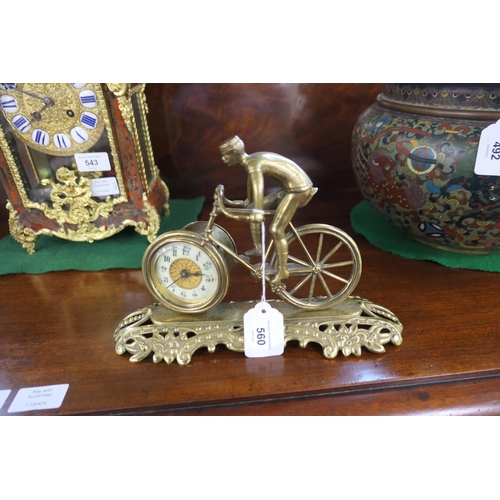 560 - British United Clock Company racing bicycle clock, circa 1910, the clock with Arabic numerals, signe... 