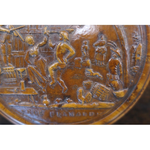 580 - Pressed burr wood circular snuff box, 19th Century, the cover decorated with a scene of revellers, t... 