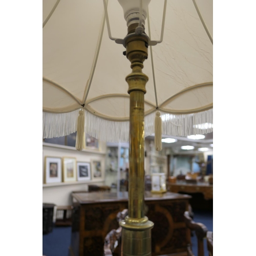 643 - Edwardian brass extending standard lamp, centred with a galleried circular tray detailed with Islami... 