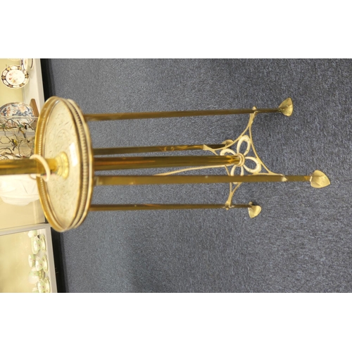 643 - Edwardian brass extending standard lamp, centred with a galleried circular tray detailed with Islami... 