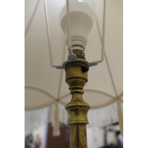 643 - Edwardian brass extending standard lamp, centred with a galleried circular tray detailed with Islami... 