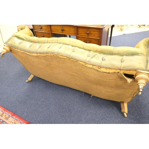 633 - Green deep buttoned leather upholstered chesterfield style settee, with a low back and  serpentine f... 