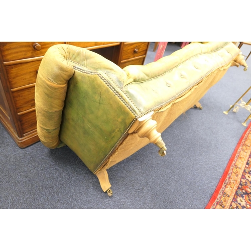 633 - Green deep buttoned leather upholstered chesterfield style settee, with a low back and  serpentine f... 