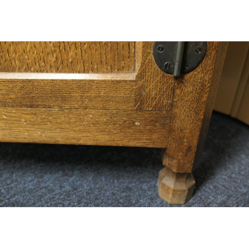 698 - Workshop of Robert 'Mouseman' Thompson, English oak dresser and plate rack, post 1971, the panelled ... 