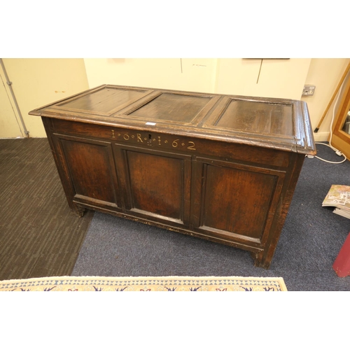 608 - Charles II oak joined coffer, dated 1662, the three recessed panel top over a front carved with '16 ... 