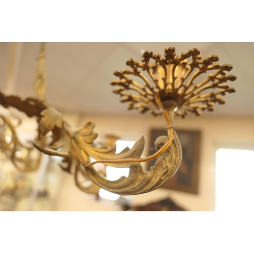 676 - French gilt brass ten branch chandelier, late 19th/early 20th Century, cast throughout with acanthus... 