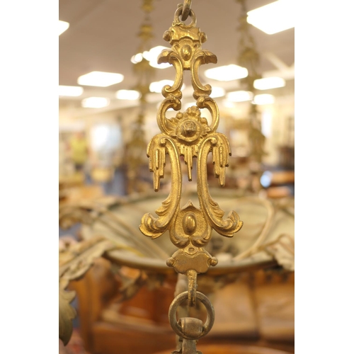 676 - French gilt brass ten branch chandelier, late 19th/early 20th Century, cast throughout with acanthus... 