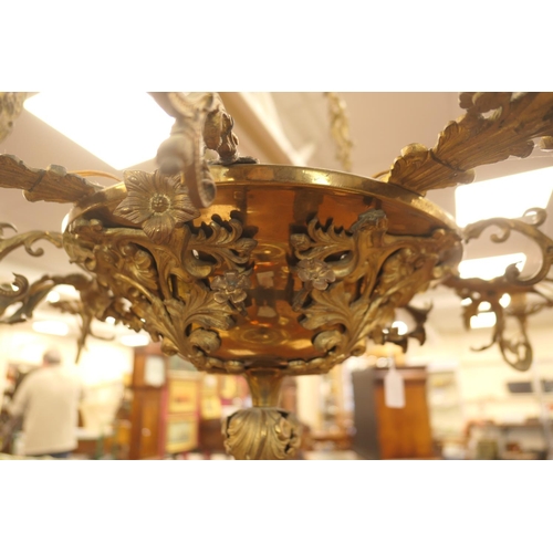 676 - French gilt brass ten branch chandelier, late 19th/early 20th Century, cast throughout with acanthus... 