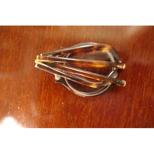 546 - Pair of George V tortoiseshell folding spectacles, with gold coloured bridge and hinges, with faux s... 