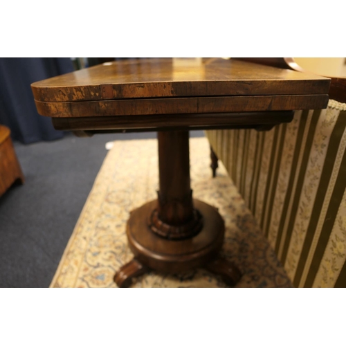 672 - William IV rosewood folding pedestal card table, circa 1835, the top swivelling over an acanthus car... 